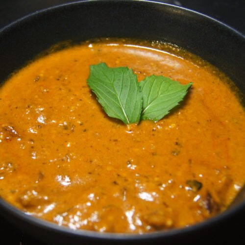 Beef Korma with creamy sauce, spices, and tender beef chunks