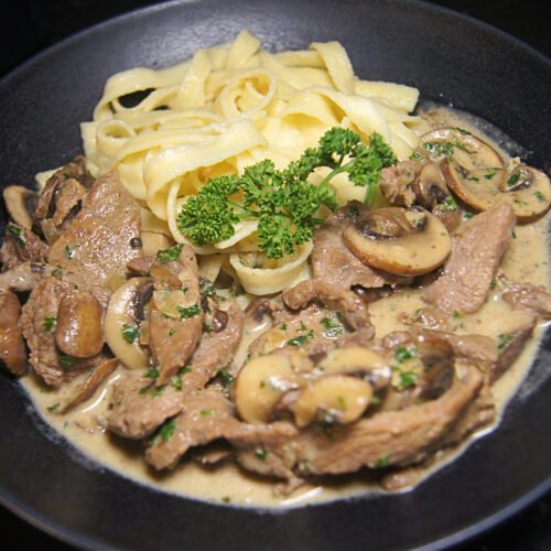 Zurich-style veal with creamy white wine sauce, mushrooms, and spaetzle